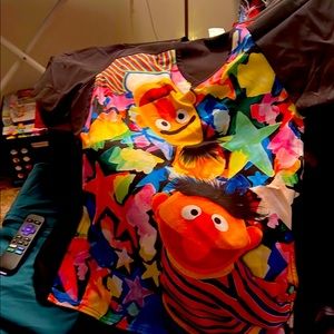 Women nursing Sesame Street scrub top